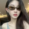 2024 New modern retro high-end tea-colored narrow-framed small brown sunglasses for women with round faces to make them look slimmer. Cat-eye sunglasses details Picture